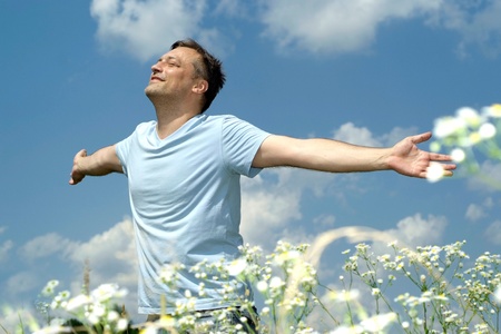 Interesting man enjoys a sense of freedom in natureの写真素材