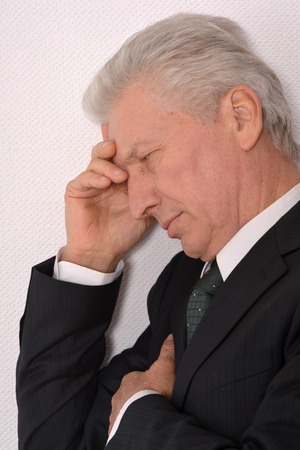 Portrait of Elderly thoughtful businessmanの写真素材