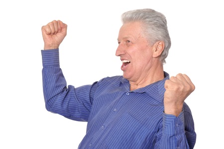 Portrait of happy senior man on white backgroundの写真素材