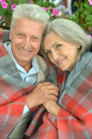 Happy Mature couple in the park in summer dayの写真素材