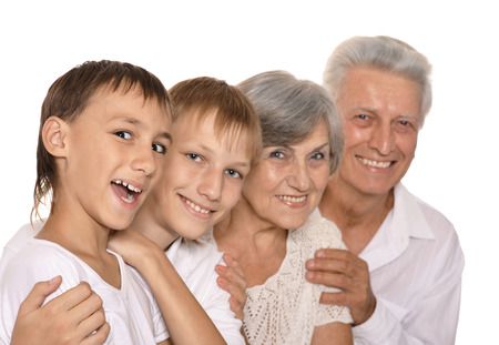 Portrait of a happy grandparents and their two grandchildrenの写真素材