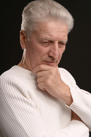 Portrait of a sad senior man close-upの写真素材