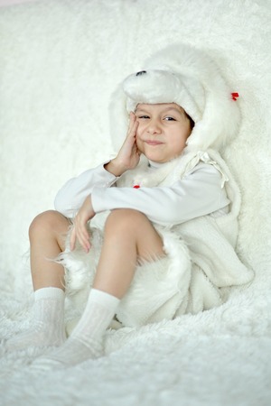 Portrait of a little girl in cute hatの写真素材