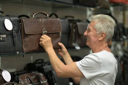 Portrait of a nice mature man in shopping mallの写真素材