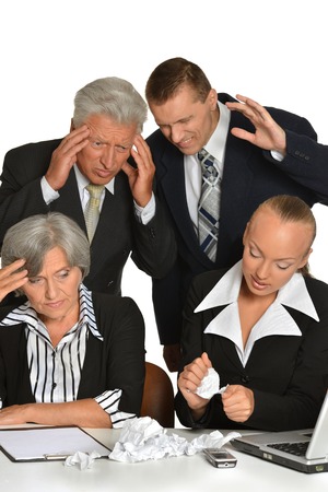 Portrait  of business people at work with laptopの写真素材