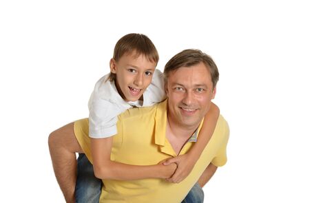 Portrait of happy father and son. Isolated on whiteの写真素材