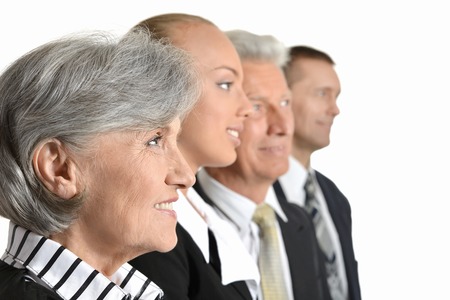 Successful Businesspeople at work on white backgroundの写真素材