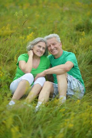 Happy Mature couple in the park in summer dayの写真素材