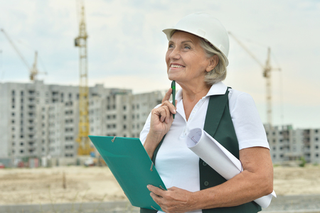 Portrait of senior  woman  in under constructionの写真素材