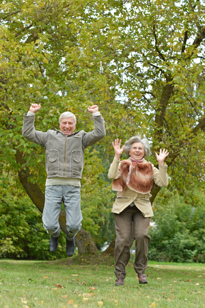Portrait of a couple having fun in parkの写真素材