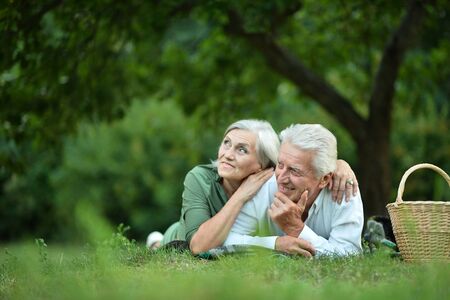 Portrait of Amusing old couple in summer parkの写真素材