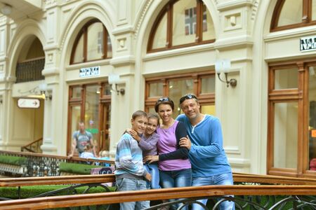 Portrait of a happy family  walking in cityの写真素材