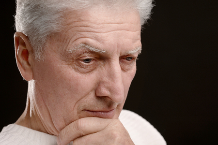 Portrait of a sad senior man close upの写真素材