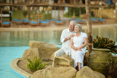 Happy Mature couple enjoy fresh air and stunning view on vacationの写真素材