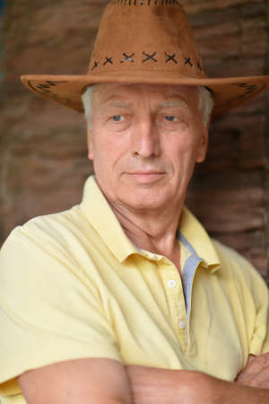 Portrait of a nice mature man in hatの写真素材