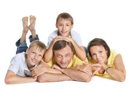 Cute family  posing on a white background