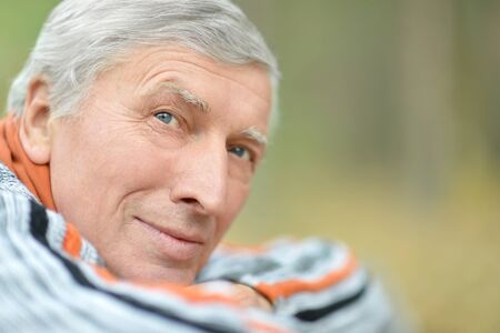 Portrait of a  senior man in forest