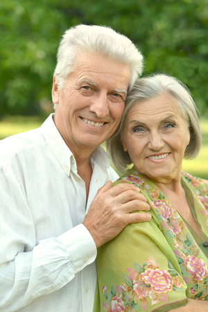 Portrait of a loving mature couple  in summer parkの写真素材