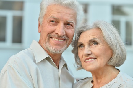 Loving mature couple  in a summer park