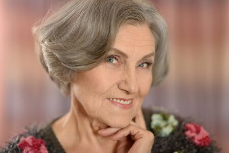 Portrait of a senior woman at homeの写真素材