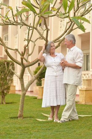 Portrait of a senior couple relax at hotel resortの写真素材
