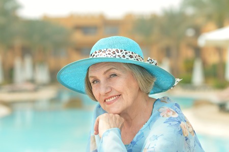 Portrait of nice senior woman at resort vacationの写真素材