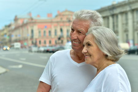 Portrait of a nice mature couple in townの写真素材