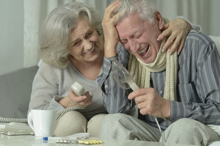 Portrait of elderly man with flu inhalationの写真素材