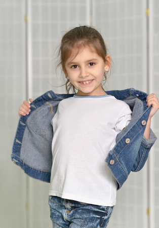 portrait of cute little girl posing at homeの写真素材