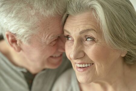 Portrait of a happy senior couple at homeの写真素材
