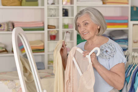 Beautiful senior woman in a shopping centerの写真素材