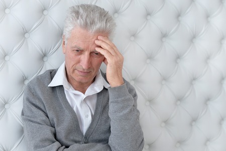 Portrait of a sad senior man faceの写真素材