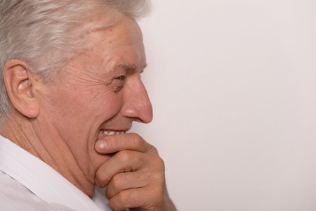 Portrait of happy senior man at homeの写真素材