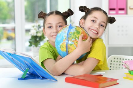 portrait of Cute girls  on lesson at schoolの写真素材