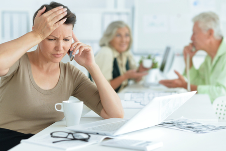 Portrait Of working business people In Officeの写真素材