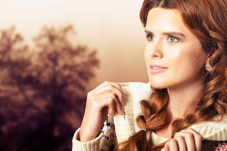 Portrait of beautiful young woman looking at the distance