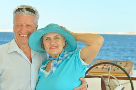 mature couple in love, travel, enjoy summer, posing outdoorsの写真素材