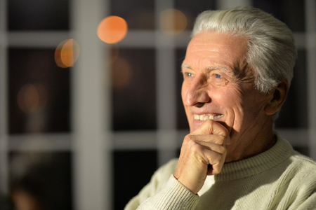 Portrait of a smiling senior man close-upの写真素材