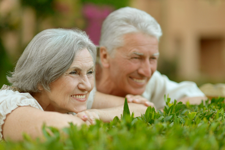 mature couple in love, travel, enjoy summer, posing outdoorsの写真素材