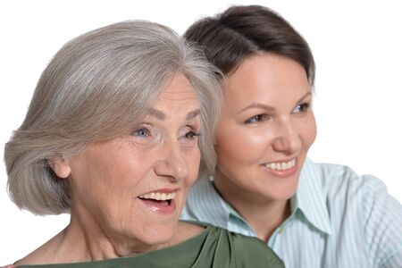 senior mother with adult daughter