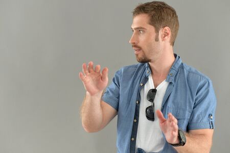 young man gesticulating