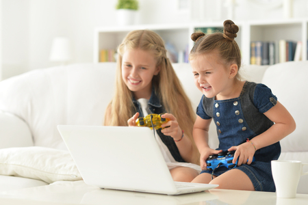 sisters play video gameの写真素材