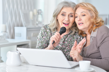 Elderly people singing karaokeの写真素材