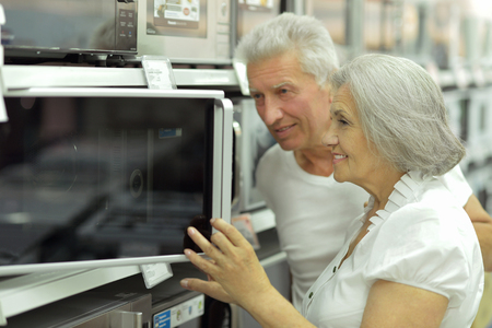 senior couple in a shopping centerの写真素材
