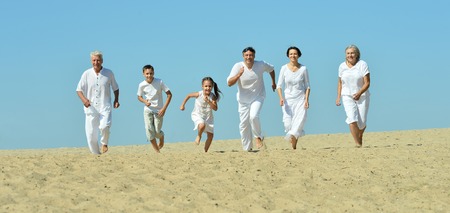 Family on sand beach