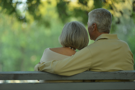 senior couple resting outdoorsの写真素材