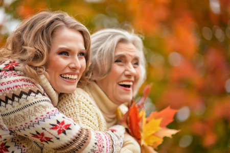 Senior woman with daughter restingの写真素材