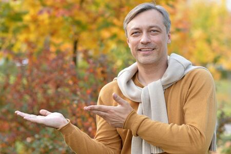 man showing somethingの写真素材