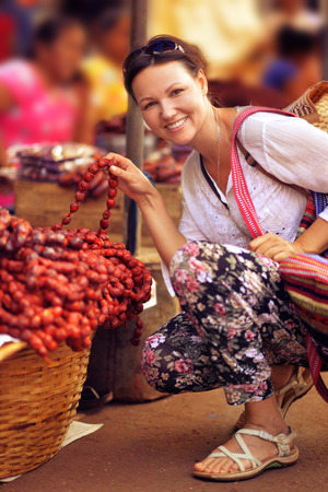 young woman choosing accessoriesの写真素材