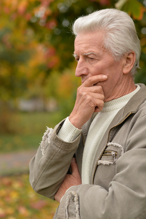 Portrait of a senior man posing outdoorsの写真素材